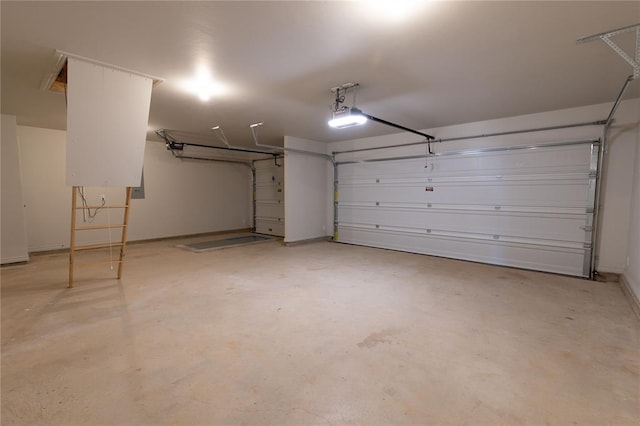 garage featuring a garage door opener