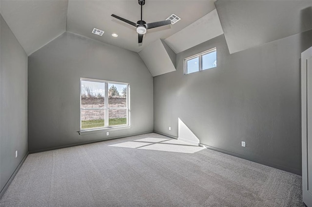 bonus room featuring ceiling fan, lofted ceiling, and light carpet