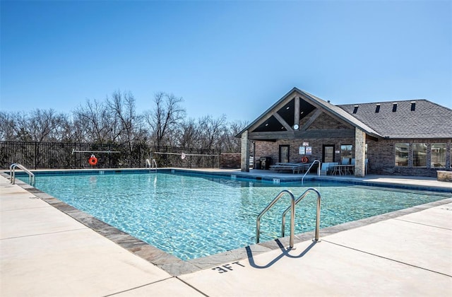 view of swimming pool featuring a patio