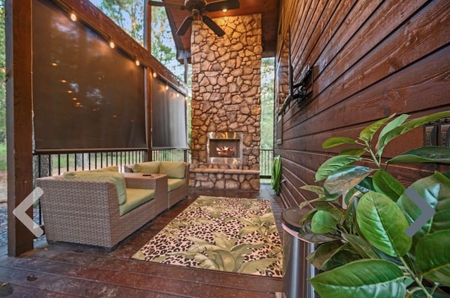 exterior space featuring an outdoor stone fireplace