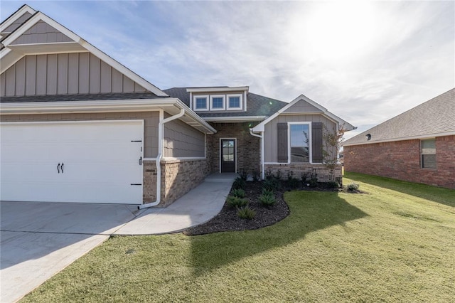 craftsman-style home featuring a garage and a front yard