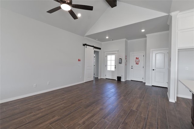 interior space featuring ceiling fan, a barn door, beamed ceiling, dark hardwood / wood-style floors, and ornamental molding