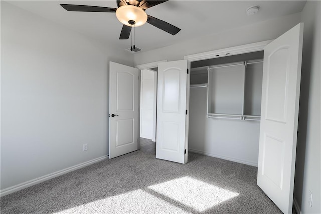 unfurnished bedroom with carpet floors, a closet, and ceiling fan