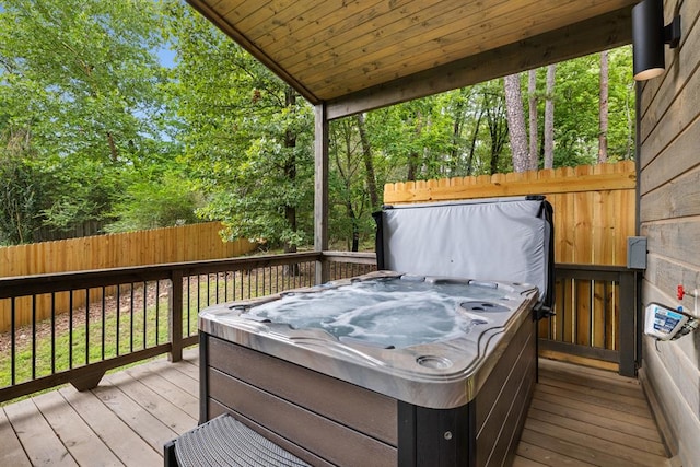 deck with a hot tub