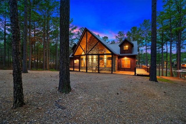 view of front of property featuring a wooden deck