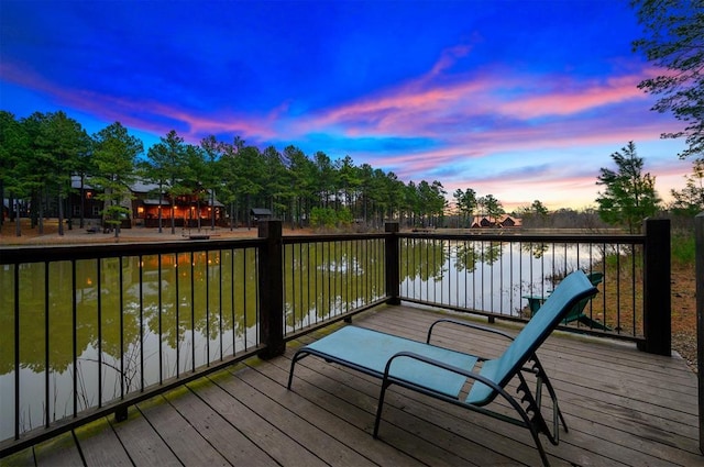 deck at dusk with a water view