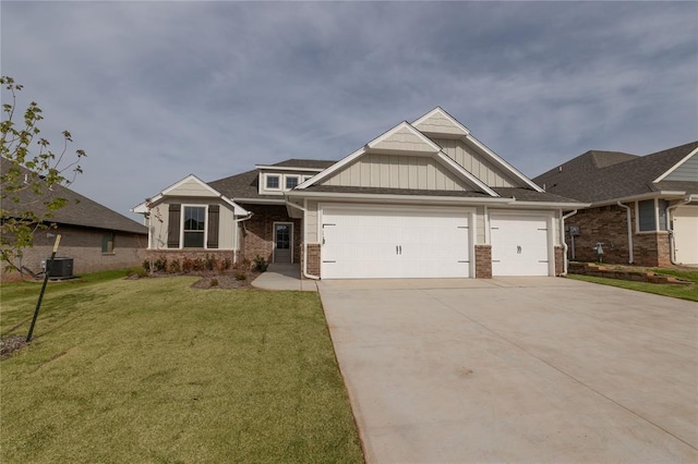 craftsman-style home with central AC, a garage, and a front lawn