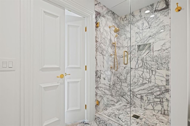 bathroom with an enclosed shower