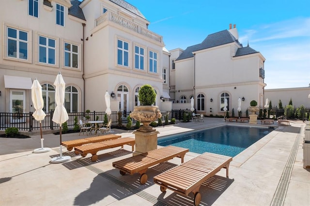 view of pool with a patio area