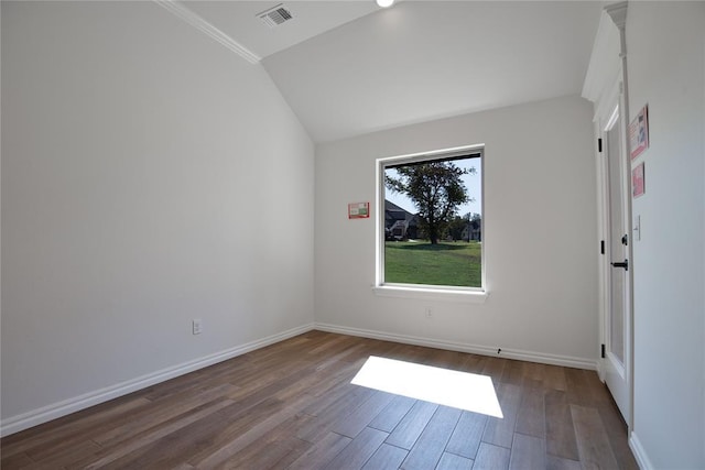 8800 Tyrion Dr, Edmond, OK 73007 - empty room with lofted ceiling and dark wood-style floors