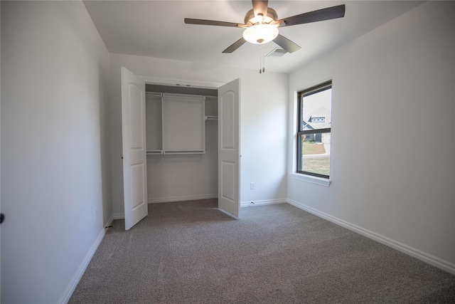 8800 Tyrion Dr, Edmond, OK 73007 - unfurnished bedroom with carpet flooring, a closet, and ceiling fan