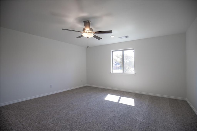 8800 Tyrion Dr, Edmond, OK 73007 - empty room with a ceiling fan and carpet flooring