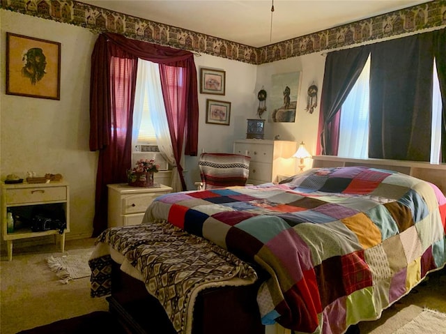 bedroom featuring carpet flooring and cooling unit