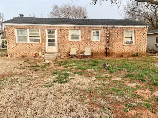 back of house with cooling unit