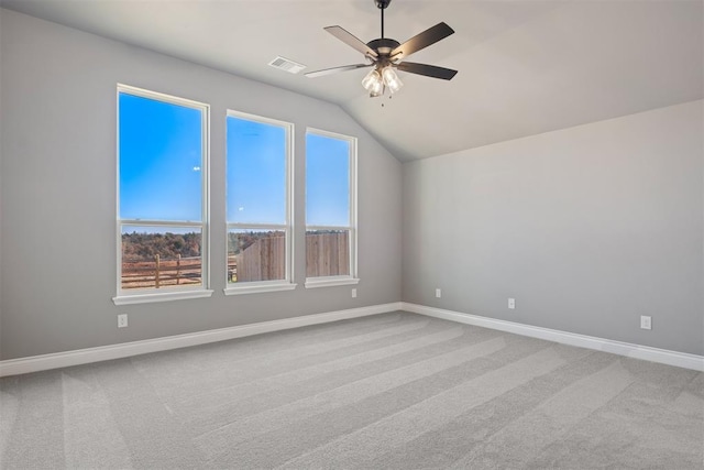 interior space with ceiling fan and lofted ceiling