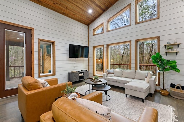 sunroom / solarium featuring wooden ceiling and lofted ceiling