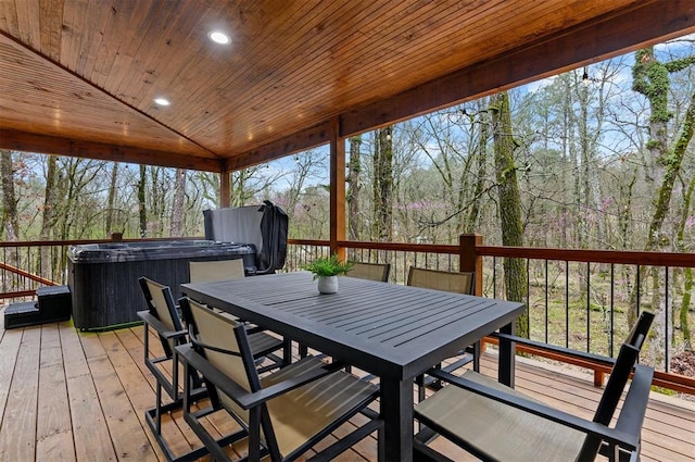 deck featuring a hot tub