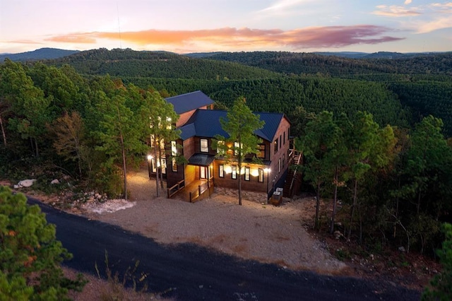 aerial view at dusk with a mountain view