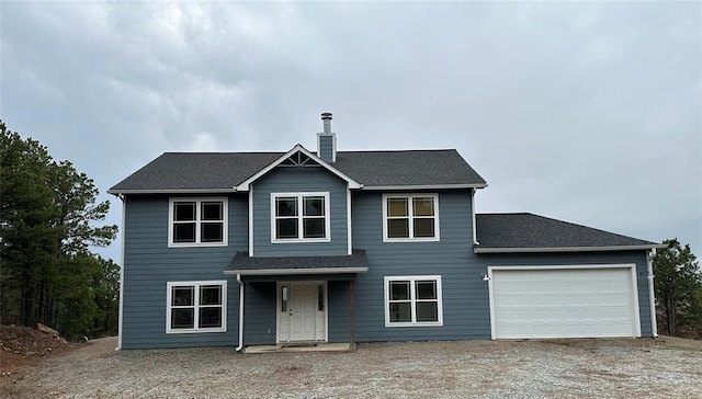 view of front property with a garage