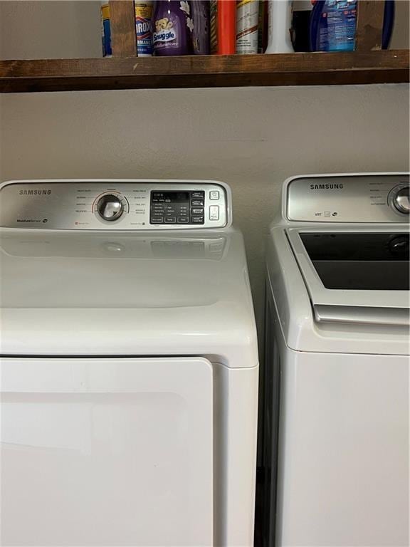 laundry room with independent washer and dryer