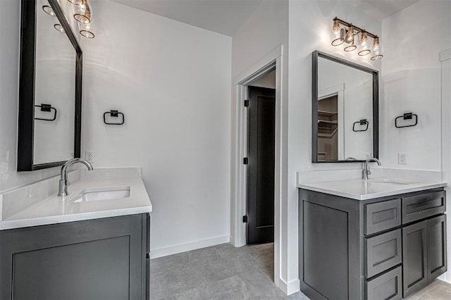 bathroom with tile patterned floors and vanity