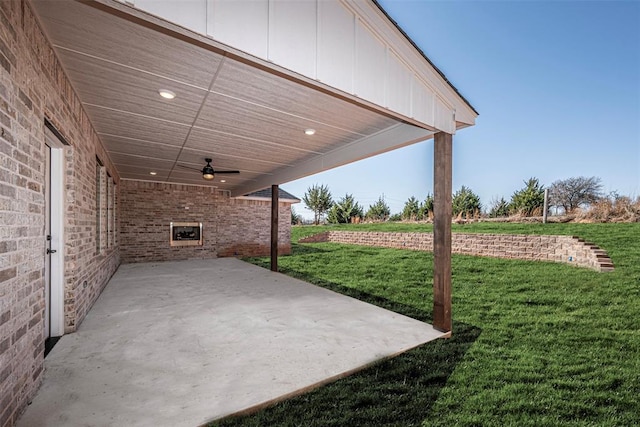 view of patio / terrace featuring ceiling fan