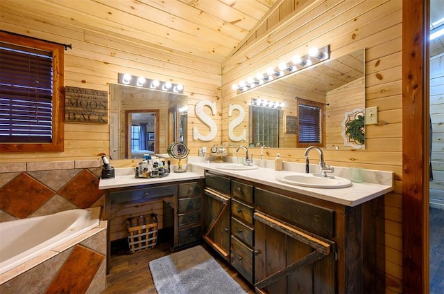 bathroom with hardwood / wood-style floors, vanity, wood ceiling, and vaulted ceiling