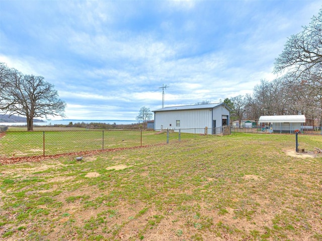 view of yard with a rural view