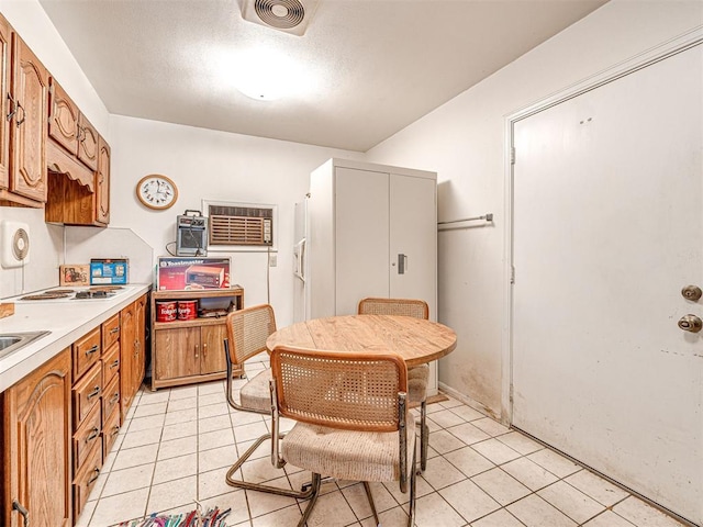 kitchen with light tile patterned floors