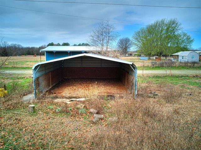 exterior space featuring a rural view