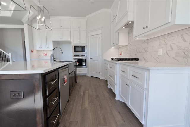 kitchen with stainless steel appliances and white cabinetry