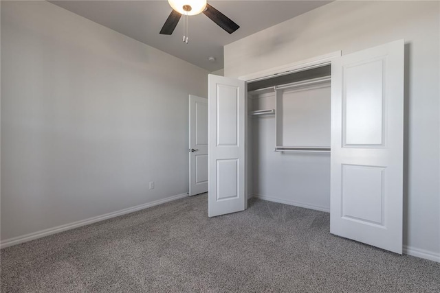 unfurnished bedroom featuring carpet, ceiling fan, and a closet