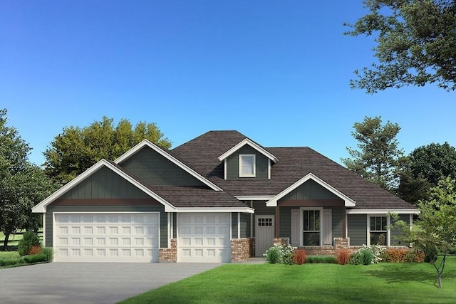 craftsman-style home featuring a front yard and a garage