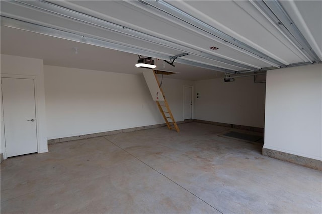 garage featuring a garage door opener