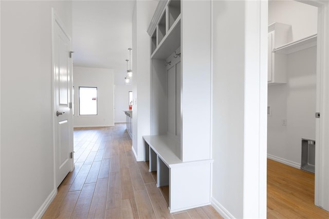 mudroom with light wood-type flooring