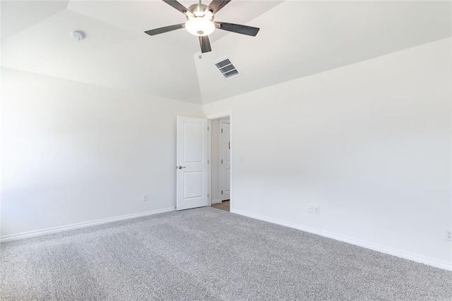 empty room with carpet, ceiling fan, and vaulted ceiling