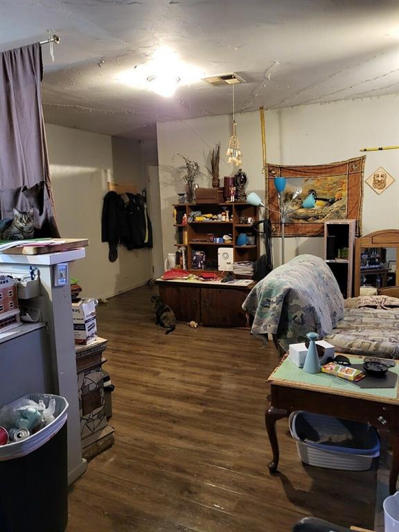 interior space with dark hardwood / wood-style floors