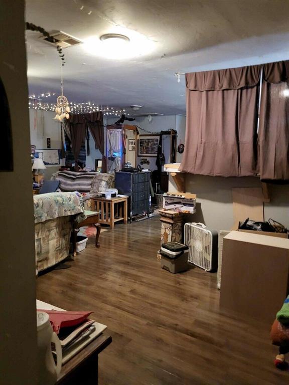 interior space with dark wood-type flooring