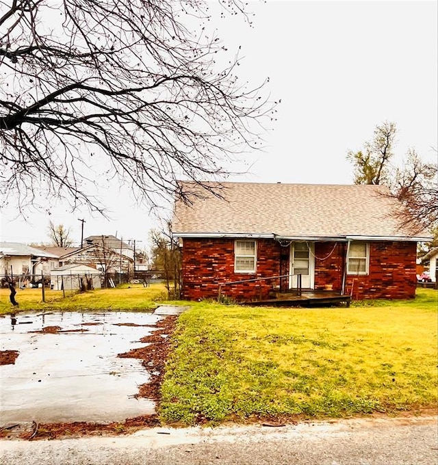 view of home's exterior featuring a lawn