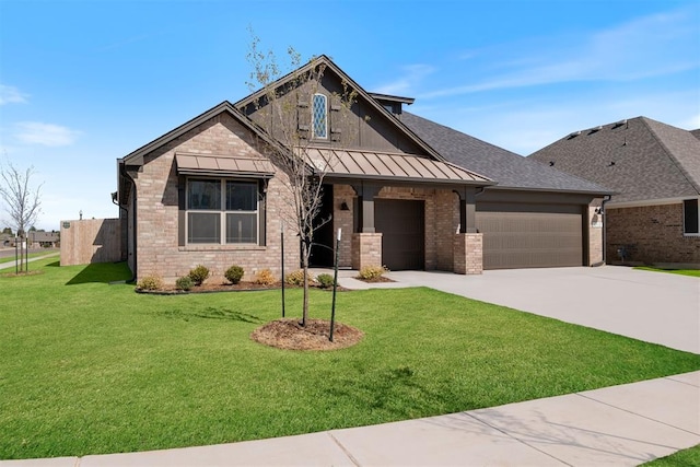 craftsman-style home featuring a garage and a front lawn