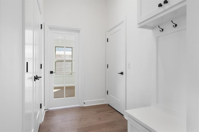 mudroom with light hardwood / wood-style flooring