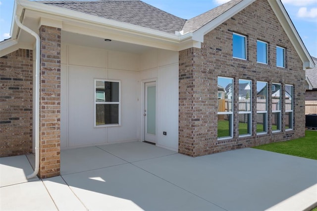 rear view of house with a patio