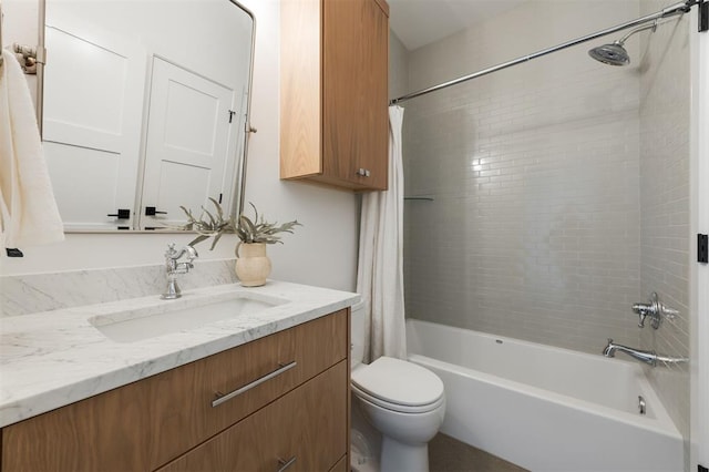 full bathroom with vanity, toilet, and shower / tub combo