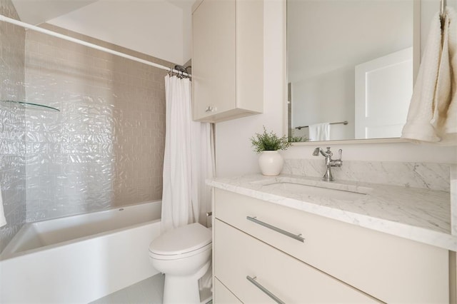 full bathroom with vanity, shower / bathtub combination with curtain, and toilet