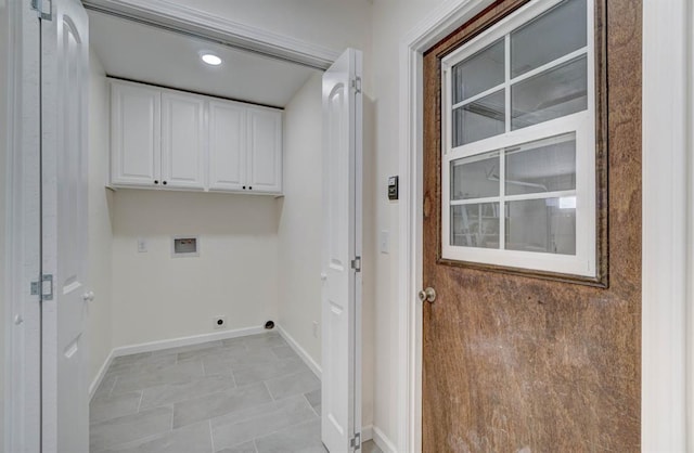 laundry room featuring cabinets, washer hookup, and hookup for an electric dryer