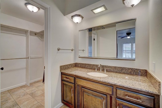 bathroom with vanity and ceiling fan