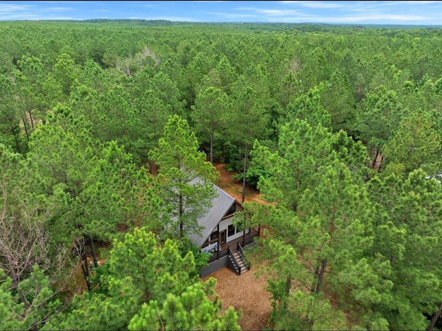 aerial view featuring a view of trees