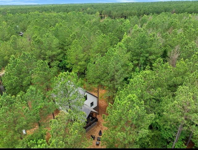 aerial view with a wooded view