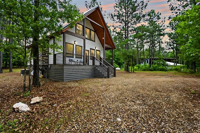 view of front of home featuring stairs