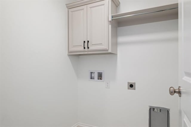 laundry room featuring cabinets, washer hookup, and electric dryer hookup